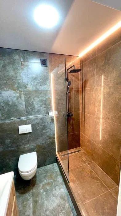 Ванная с душевой зоной walk-in — результат ремонта